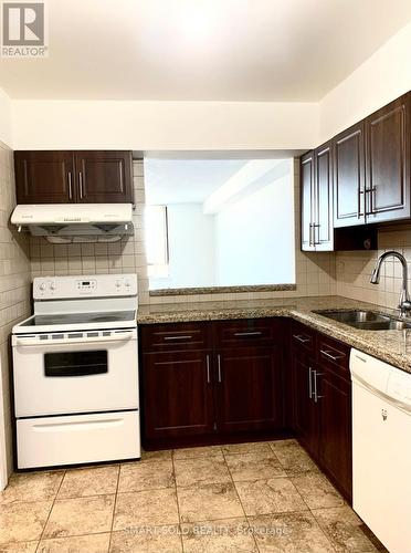 1519 - 75 Bamburgh Circle, Toronto, ON - Indoor Photo Showing Kitchen With Double Sink