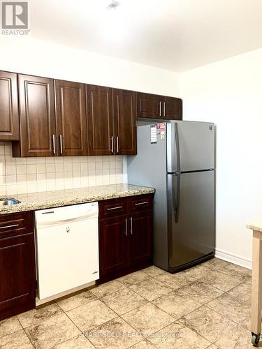 1519 - 75 Bamburgh Circle, Toronto, ON - Indoor Photo Showing Kitchen