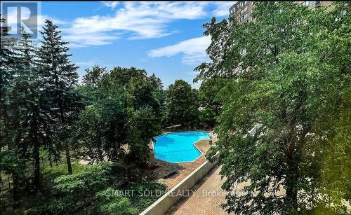 1519 - 75 Bamburgh Circle, Toronto, ON - Outdoor With In Ground Pool