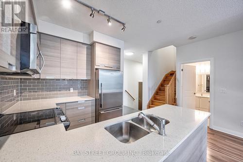 108 - 55 Eglinton Avenue W, Mississauga, ON - Indoor Photo Showing Kitchen With Double Sink