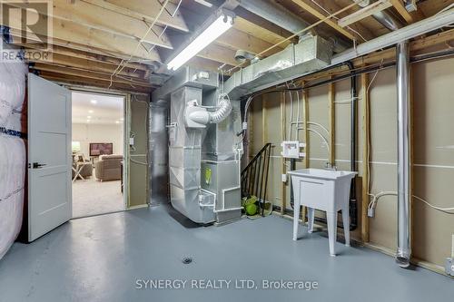 Utility Room - 32 Clark Street, Strathroy-Caradoc (Melbourne), ON - Indoor Photo Showing Basement