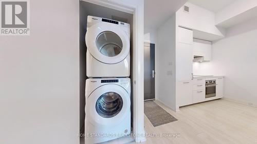 713 - 33 Frederick Todd Way, Toronto, ON - Indoor Photo Showing Laundry Room