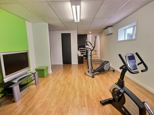 Family room - 5 Place Labelle, Rouyn-Noranda, QC - Indoor Photo Showing Gym Room