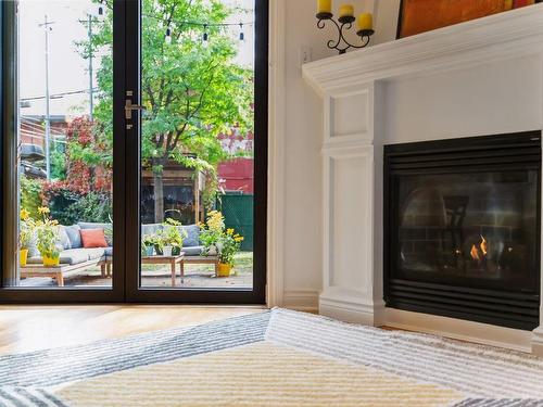 Living room - 6010 Rue Molson, Montréal (Rosemont/La Petite-Patrie), QC - Indoor With Fireplace