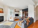 Salon - 6010 Rue Molson, Montréal (Rosemont/La Petite-Patrie), QC  - Indoor Photo Showing Living Room With Fireplace 