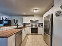 Kitchen - 301-16245 Rue Eugénie-Tessier, Montréal (Rivière-Des-Prairies/Pointe-Aux-Trembles), QC  - Indoor Photo Showing Kitchen With Double Sink 