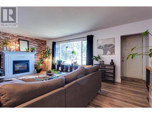 495 Donhauser Road, Kelowna, BC - Indoor Photo Showing Living Room With Fireplace