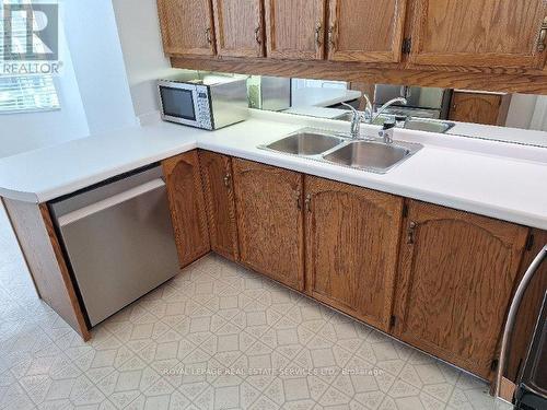 1908 - 1 Aberfoyle Crescent, Toronto, ON - Indoor Photo Showing Kitchen With Double Sink