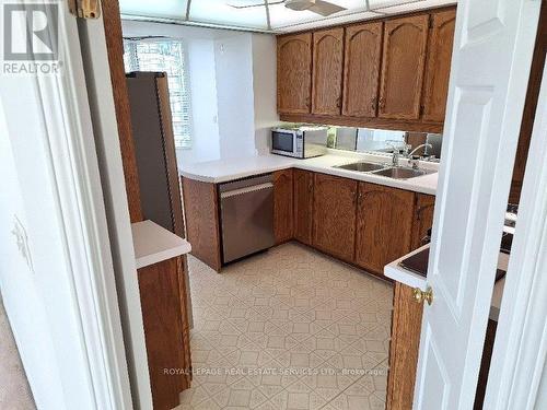 1908 - 1 Aberfoyle Crescent, Toronto, ON - Indoor Photo Showing Kitchen With Double Sink