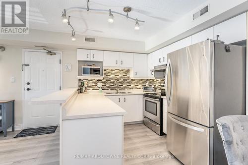 204 - 2010 Cleaver Avenue, Burlington, ON - Indoor Photo Showing Kitchen With Stainless Steel Kitchen With Upgraded Kitchen