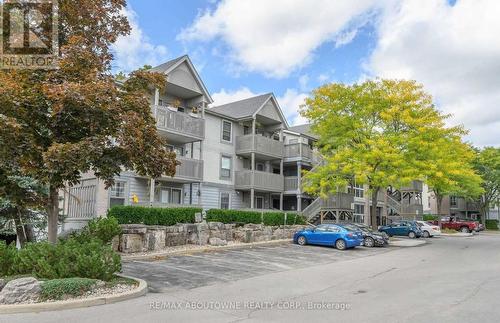 204 - 2010 Cleaver Avenue, Burlington, ON - Outdoor With Balcony With Facade