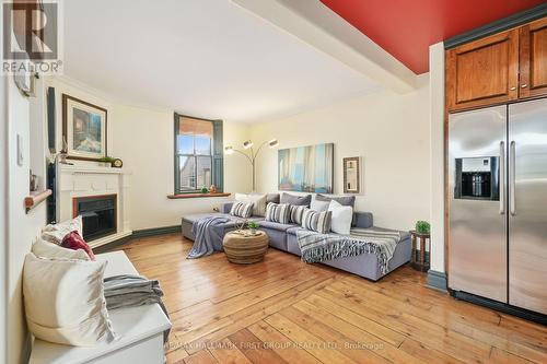 2 - 18 Chapel Street, Cobourg, ON - Indoor Photo Showing Living Room With Fireplace