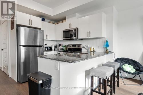 211 - 26 Lowes Road W, Guelph, ON - Indoor Photo Showing Kitchen With Stainless Steel Kitchen