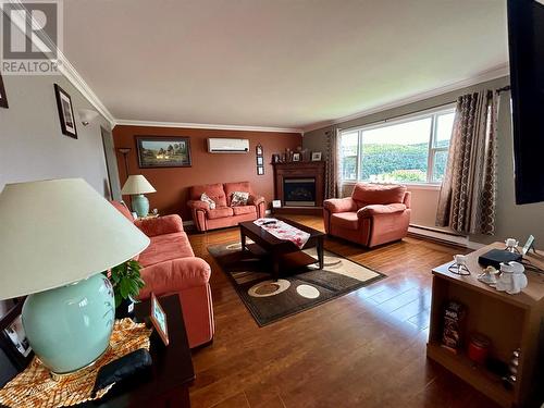 2 Old Settlement Hill, Freshwater Placentia, NL - Indoor Photo Showing Living Room With Fireplace