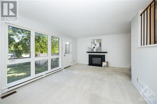 26 Peary Way, Ottawa, ON - Indoor With Fireplace