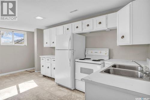 7124 Dewdney Avenue, Regina, SK - Indoor Photo Showing Kitchen With Double Sink