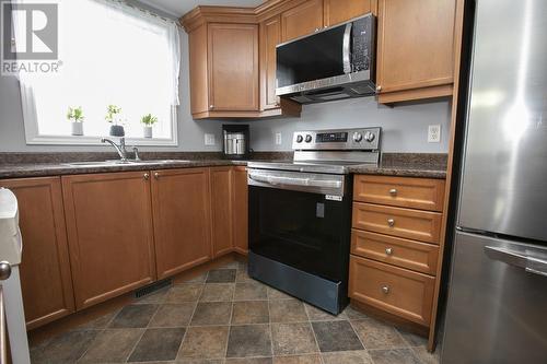 18 Queensgate Blvd, Sault Ste. Marie, ON - Indoor Photo Showing Kitchen With Double Sink