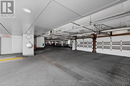 812 - 36 Lee Centre Drive, Toronto, ON - Indoor Photo Showing Garage