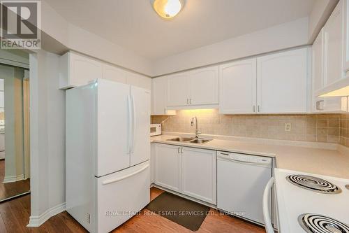 104 - 1071 Queens Avenue, Oakville, ON - Indoor Photo Showing Kitchen With Double Sink