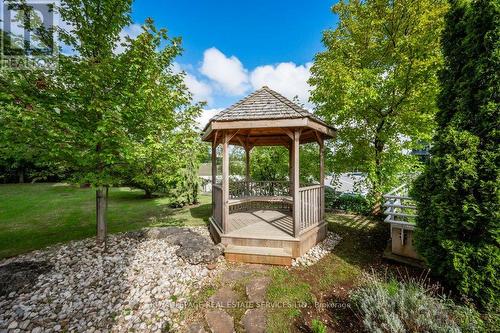 104 - 1071 Queens Avenue, Oakville, ON - Outdoor With Backyard