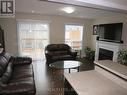 77 Oakes Crescent, Guelph, ON  - Indoor Photo Showing Living Room With Fireplace 