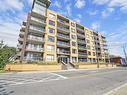 Frontage - 209-795 Ch. Du Bord-Du-Lac-Lakeshore, Dorval, QC  - Outdoor With Balcony With Facade 