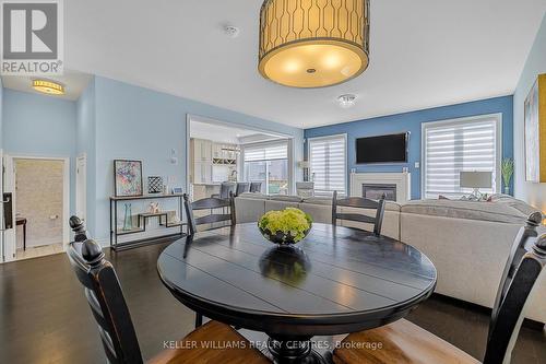 57 Clifford Fairbarn Drive, East Gwillimbury, ON - Indoor Photo Showing Dining Room With Fireplace