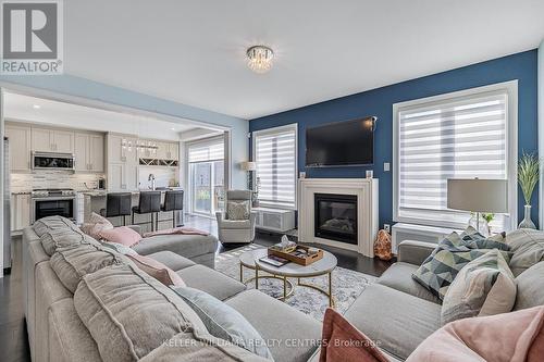 57 Clifford Fairbarn Drive, East Gwillimbury, ON - Indoor Photo Showing Living Room With Fireplace