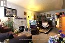 27A Warren Road, Norfolk (Simcoe), ON  - Indoor Photo Showing Living Room With Fireplace 