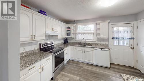 4619 7Th Avenue, Regina, SK - Indoor Photo Showing Kitchen With Double Sink