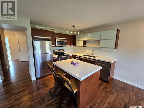 406 1303 Paton Crescent, Saskatoon, SK - Indoor Photo Showing Kitchen With Stainless Steel Kitchen With Double Sink