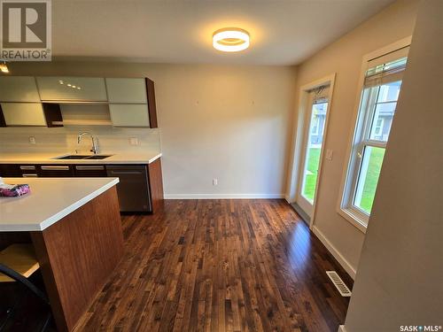 406 1303 Paton Crescent, Saskatoon, SK - Indoor Photo Showing Kitchen With Double Sink