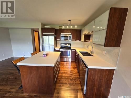 406 1303 Paton Crescent, Saskatoon, SK - Indoor Photo Showing Kitchen With Stainless Steel Kitchen With Double Sink