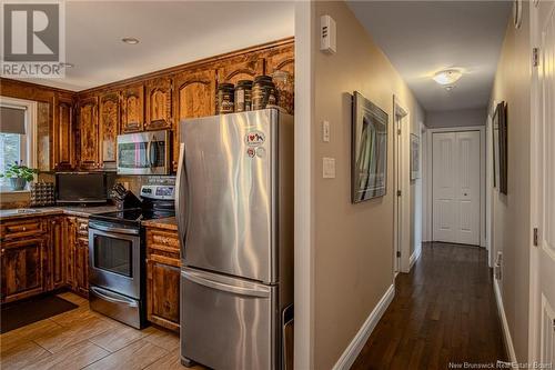 21 Homestead Drive, Hampton, NB - Indoor Photo Showing Kitchen