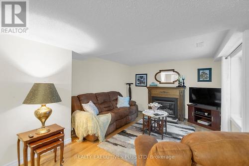 8 Lombardy Crescent, Brampton, ON - Indoor Photo Showing Living Room With Fireplace