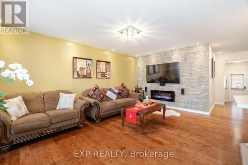 504 Cavanagh Lane, Milton, ON - Indoor Photo Showing Living Room With Fireplace