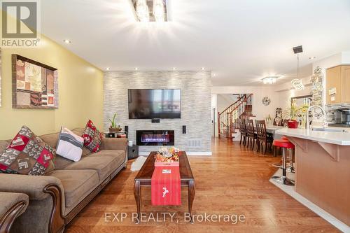 504 Cavanagh Lane, Milton, ON - Indoor Photo Showing Living Room With Fireplace