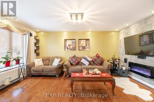 504 Cavanagh Lane, Milton, ON - Indoor Photo Showing Living Room With Fireplace