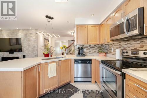 504 Cavanagh Lane, Milton, ON - Indoor Photo Showing Kitchen With Upgraded Kitchen