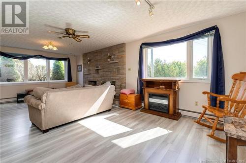 215 Hughes Lane, Saint John, NB - Indoor Photo Showing Living Room With Fireplace