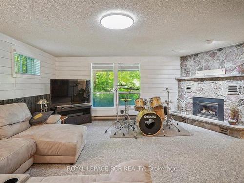 859 Sixth St N, South Bruce Peninsula, ON - Indoor Photo Showing Living Room With Fireplace