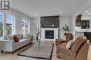 516 Newfoundland Street, Wellington North (Mount Forest), ON  - Indoor Photo Showing Living Room With Fireplace 