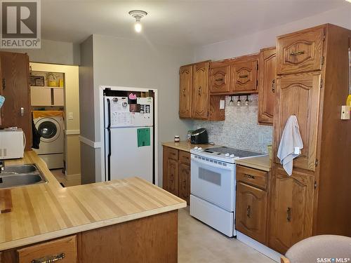 128 3Rd Avenue W, Ponteix, SK - Indoor Photo Showing Kitchen With Double Sink