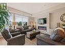 1933 Ambrosi Road Unit# 302, Kelowna, BC  - Indoor Photo Showing Living Room With Fireplace 