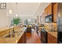 1933 Ambrosi Road Unit# 302, Kelowna, BC  - Indoor Photo Showing Kitchen With Double Sink 