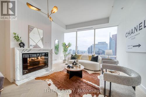 5005 - 180 University Avenue, Toronto, ON - Indoor Photo Showing Living Room With Fireplace