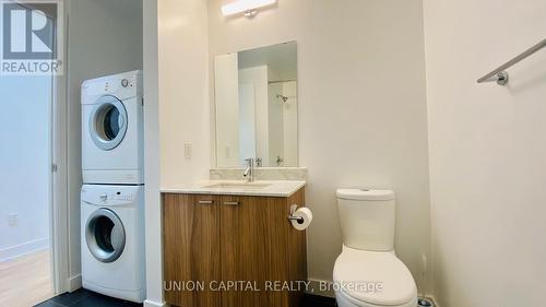 908 - 775 King Street W, Toronto, ON - Indoor Photo Showing Laundry Room