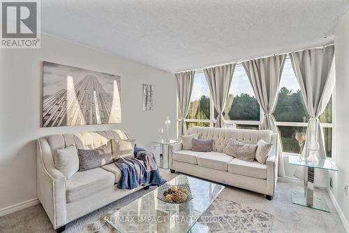 711 - 3050 Ellesmere Road, Toronto, ON - Indoor Photo Showing Living Room