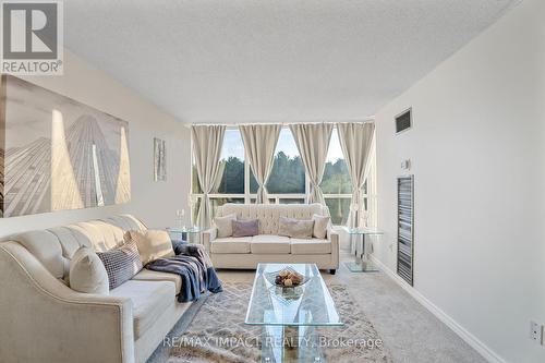 711 - 3050 Ellesmere Road, Toronto, ON - Indoor Photo Showing Living Room