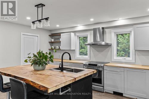 127 Paradise Road, South Algonquin, ON - Indoor Photo Showing Kitchen With Double Sink